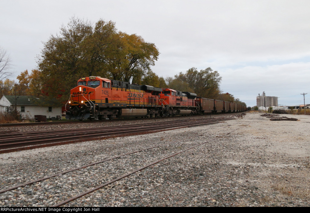 BNSF 7426 & 8400 work hard as they try to gain speed with 128 coal loads behind them